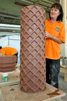 1) Hand finishing architectural terracotta ensures the character of the original piece is replicated as this Tudor chimney pot shows