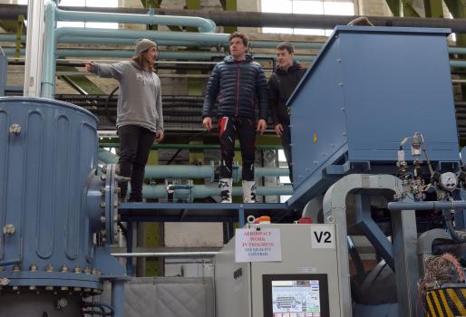 4) Dougie Lampkin with members of the video crew lining up jumping off a vacuum furnace